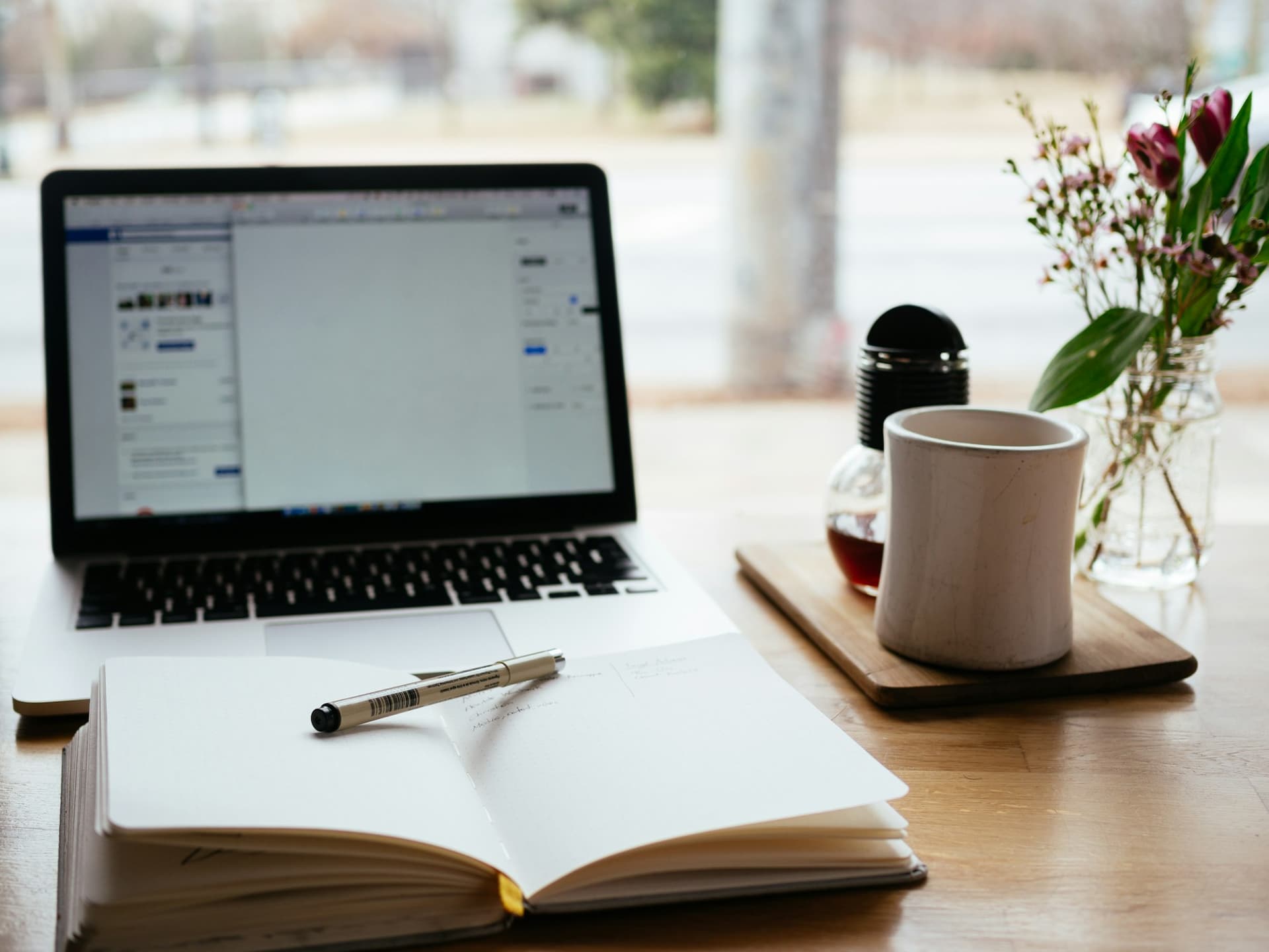 Notebook and pen for writing professional stories and experiences